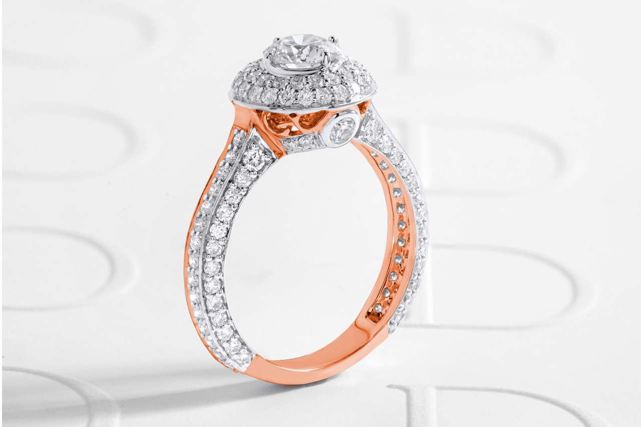 A close-up of a stunning engagement adorned with many sparking diamonds.