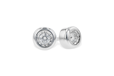 A pair of simple but elegant stud earrings by Allison Kaufman, available at Pucci’s Jewelers.