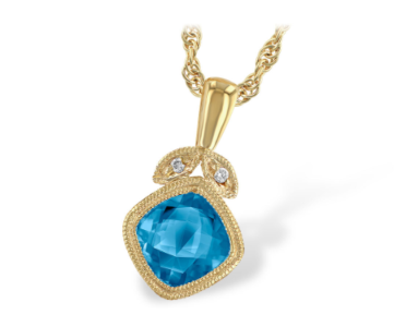 An elegant gemstone pendant necklace from Allison Kaufman, available at Pucci’s Jewelers.