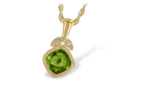 A stunning yellow gold and peridot necklace pendant from Allison-Kauffman, available at Pucci’s Jewelers.