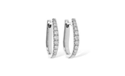 An elegant pair of Allison-Kauffman diamond huggie earrings, available at Pucci’s Jewelers.